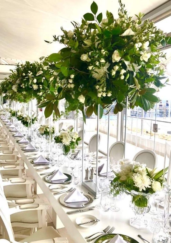 Green and white wedding reception flowers - D&D