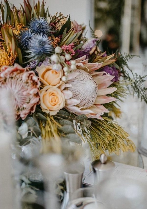 Protea flower centre piece at a reception - D&D